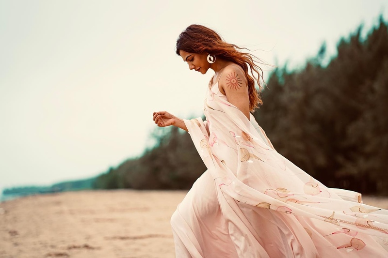 Madonna sebastian new hot saree clicks