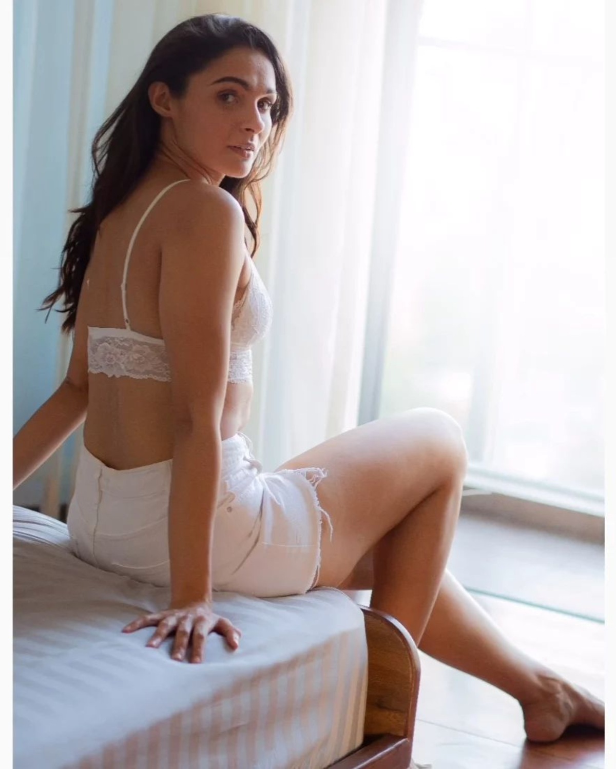 Andrea jeremiah on bed clicks