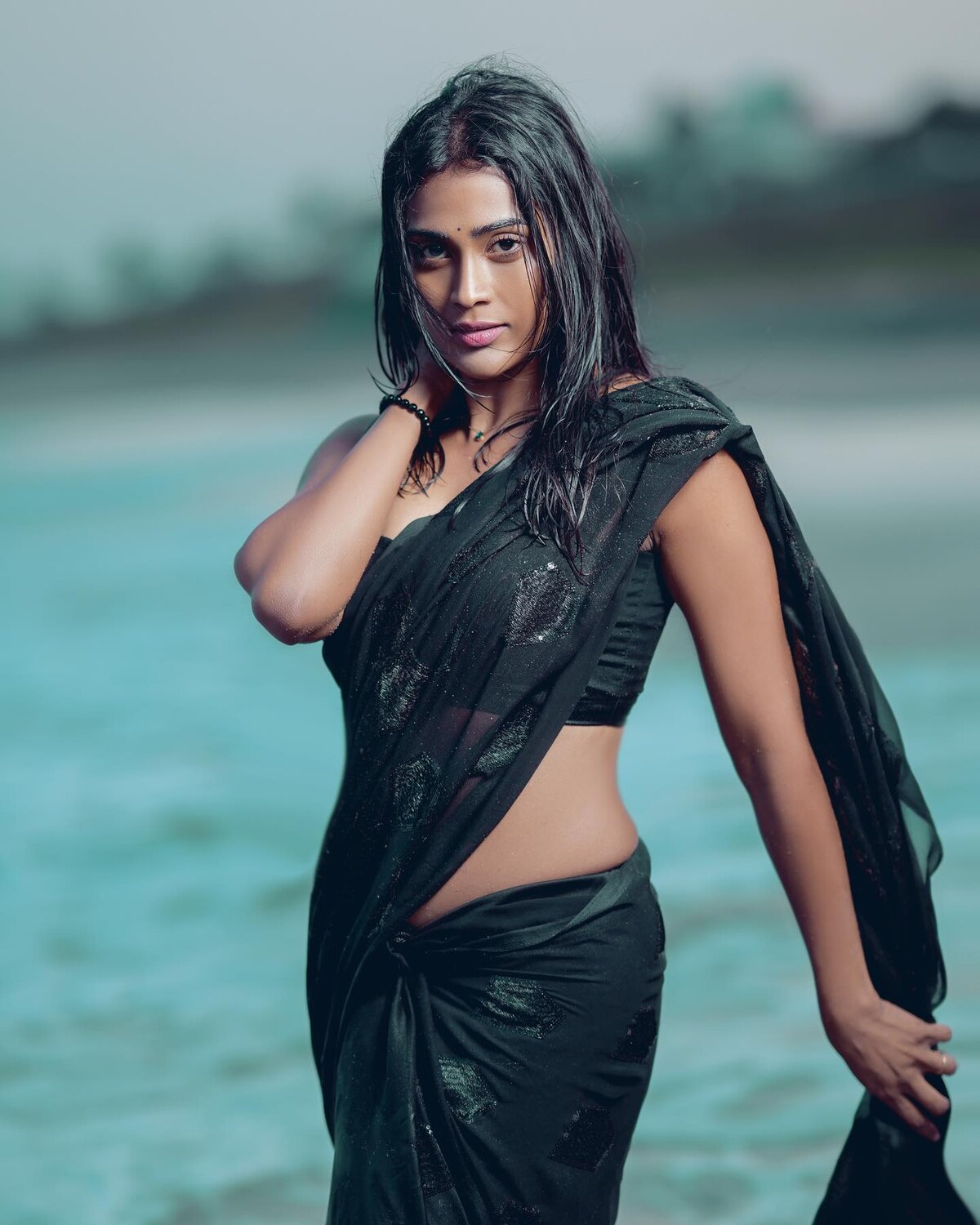 Poornima ravi in saree hot clicks