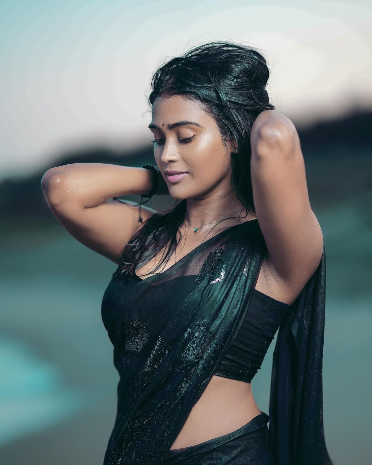 Poornima ravi in saree hot clicks